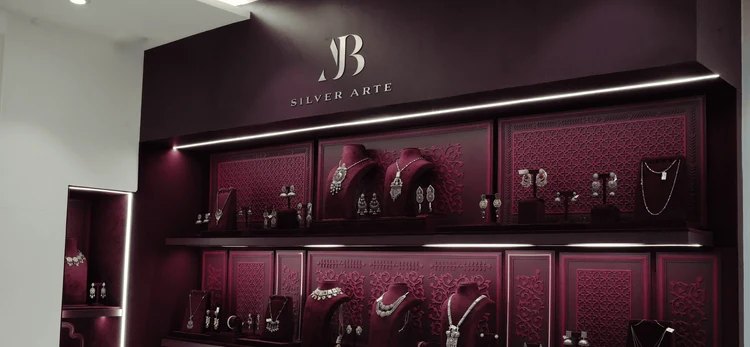 AJB Silver Arte boutique wall with necklaces and earrings on display
